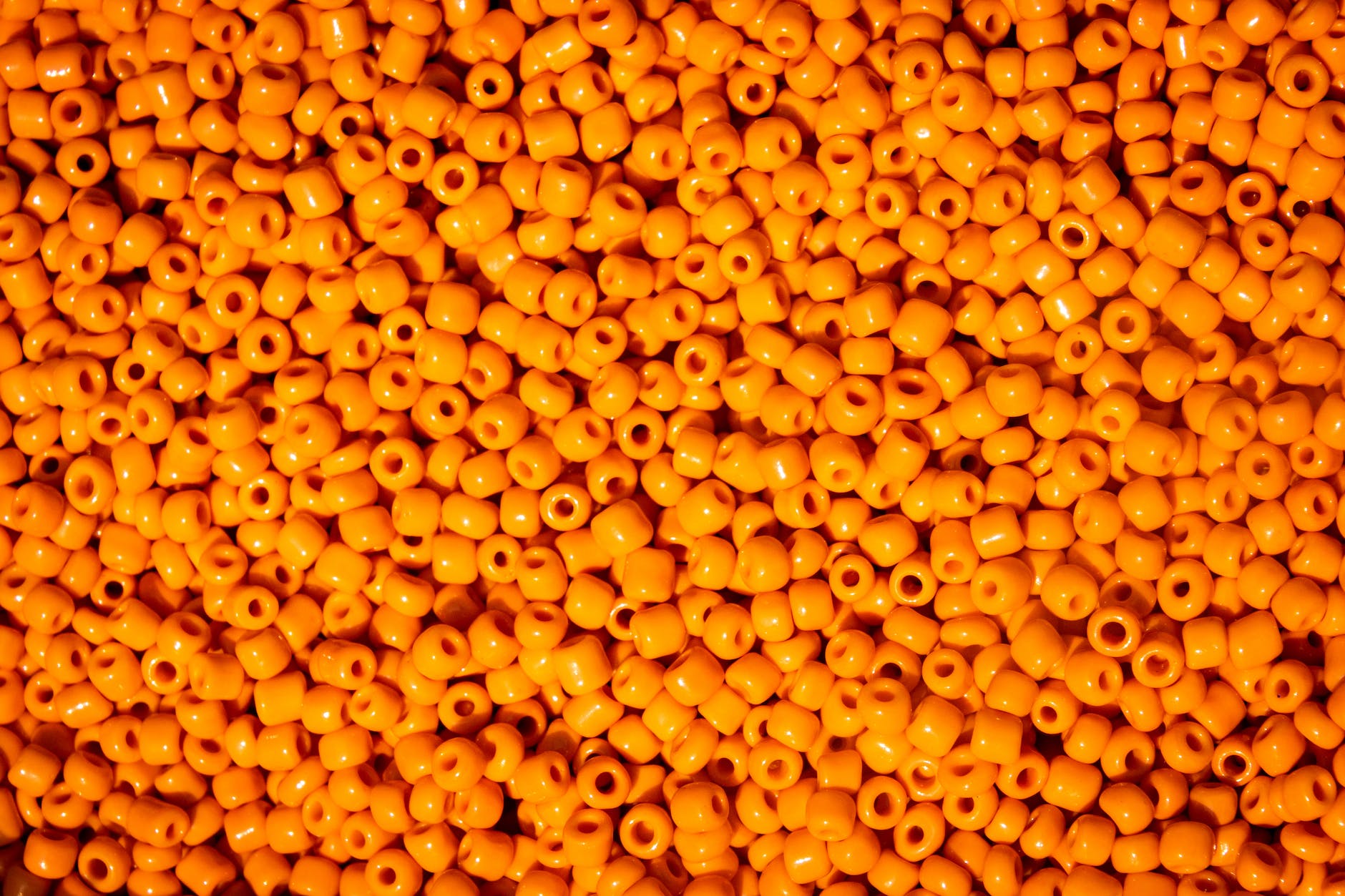 fill the frame photography of orange beads